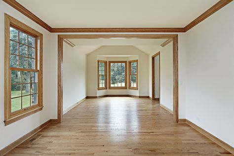 The Pros & Cons Of Painting Wood Trim - Modern Painting & Remodeling Oak Trim With Wood Floors, Light Wood Window Trim, Wood Trim Living Room, Wood Window Trim, Painting Wood Trim, Stained Wood Trim, Natural Wood Trim, Oak Wood Trim, Dark Wood Trim