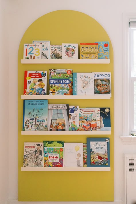 Half Wall Playroom, Kids Bookshelf Ikea Hack, Book Display On Wall, Bookshelf Ideas Kids Room, Book Shelves Ikea, Painted Arch Shelves, Ikea Book Display, Wall Book Display, Kids Book Storage Wall