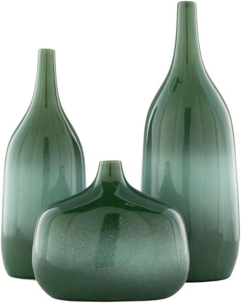 Our Sparta Collection offers an enduring presentation of the modern form that will competently revitalize your decor space. Made in China with Ceramic. For optimal product care, wipe clean with a dry cloth. Vase 100% Ceramic Outdoor Safe Colors: Multi-Colored Available in 2 colors Made in China 6.7" x 5.25" x 18",5.85" Outdoor Vases, Contemporary Vases, Elegant Vases, Vases For Sale, Green Home Decor, Green Vase, Ceramic Set, Modern Vase, Green Home