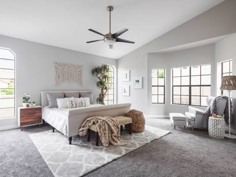 This master bedroom features light gray walls and carpet flooring topped by a rug. Grey Walls And Carpet, Bedroom Carpet Colors, Grey Carpet Bedroom, Light Gray Carpet, Lovely Bedroom, Gray Bedroom Walls, Rugs Neutral, Rugs Colorful, Rugs Design