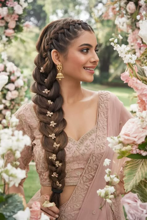 Elevate your look with stunning Indian braided hairstyles that blend tradition with modern elegance. This eye-catching hairstyle features intricate braids adorned with vibrant flowers and jewels, perfect for any festive occasion or a casual day out. Discover the beauty of Indian cultures through these unique designs that celebrate artistry and heritage. Let your hair tell a story with every twist and turn. Indian Braided Hairstyles, Braids With Jewelry, Holiday Hairstyles Easy, Hairstyles For Indian Wedding, Braided Buns, Wedding Hair Up, Fishtail Braids, Indian Wedding Hairstyles, Stylish Hairstyles