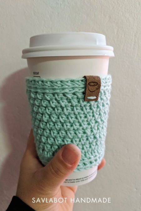 Simple Cup Cozy Free Crochet Pattern – Savlabot Cup Cozy Pattern Crochet, Easy Crochet Cup Cozy, Cup Coozie Crochet Free Pattern, Crocheted Cup Cozies, Crochet Cup Cover Free Pattern, Crocheted Cup Cozy Free Pattern, Crochet Cup Cozy Free Pattern Simple, Crochet Cup Cosy Free Pattern, Crochet Coffee Mug Free Pattern