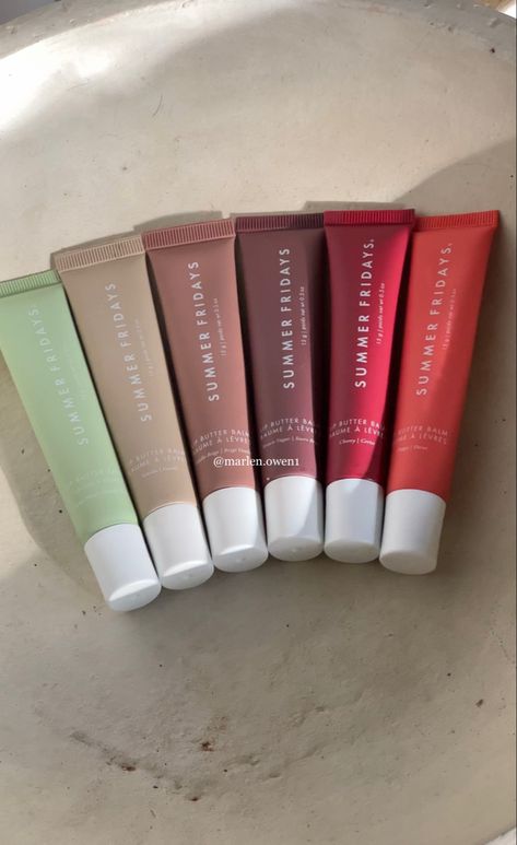 All Summer Fridays lip balms lined up. Makeup. Lip Butter Balms. Green. Beige. Brown. Cherry Red. Pink. Orange. Christmas Wishlist For Teens, Summer Fridays Lip, Lip Butter Balm, Makeup Bag Essentials, Sephora Skin Care, Lip Gloss Collection, Makeup Needs, Pretty Skin Care, Skin Care Items