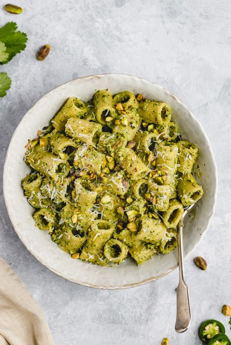 Flavorful cilantro pistachio pesto made with fresh cilantro, roasted pistachios, garlic, lime juice and a kick of heat from jalapeño. This easy pistachio pesto recipe comes together in just five minutes and is delicious on pasta, chicken, fish and more. Skip the store bought pesto for good! #pesto #pistachios #vegan #dairyfree #cilantro #sauce Moroccan Stew, Roasted Pistachios, Cottage Recipes, Healthy Pesto, Cilantro Pesto, Pesto Recipes, Pistachio Recipes, Pistachio Pesto, Cilantro Sauce