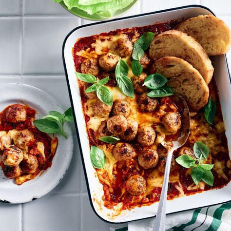 Cheesy Meatball Bake with Crusty Garlic Bread Recipe | Woolworths Ground Pork Meatballs, Perfect Meatballs, Ground Pork Recipes, Whats Gaby Cooking, Cherry Tomato Sauce, Mixer Recipes, Family Friendly Dinners, Italian Meatballs, Winter Dinner