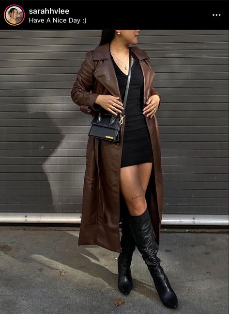 Black Dress With Brown Leather Jacket, Black Dress Brown Jacket, Long Brown Leather Trench Coat Outfit, Long Brown Trench Coat Outfit, Brown Leather Trench Outfit, Brown Leather Coat Outfit Women, Long Brown Leather Coat Outfit, Long Brown Leather Coat, Brown Long Jacket Outfit