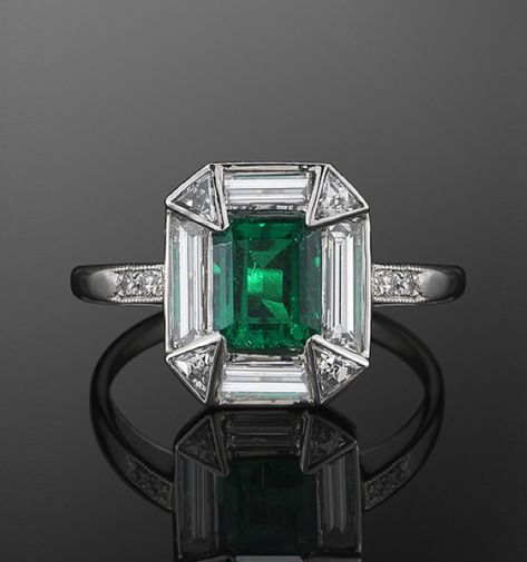 Platinum Emerald and Diamond Ring, c. 1920s.  A square emerald weighing approximately 0.75 carats is set in a halo of baguette and triangular diamonds in a platinum mounting. Flawless Diamond Ring, Origami Insects, Bracelets Rainbow, Fashion 1920s, Bijoux Art Deco, Art Deco Emerald, Loom Charms, Bows Ribbon, Fred Leighton