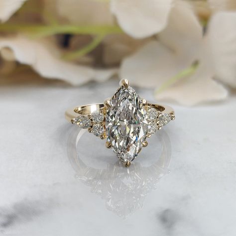 𝐒𝐭𝐨𝐧𝐞 : 𝐋𝐚𝐛 𝐆𝐫𝐨𝐰𝐧 𝐃𝐢𝐚𝐦𝐨𝐧𝐝 (𝐈𝐆𝐈 𝐂𝐞𝐫𝐭𝐢𝐟𝐢𝐞𝐝 ) →Shape: Marquise Cut  →Weight: 2.00 Carat  →Color: F →Clarity : VS1 →Polish/Symmetry - Ex/Ex →Fluorescence - None →Side Accent Diamond Shape: Round & Marquise Cut →Side Accent Diamond Weight: 0.62 Ct 𝐌𝐞𝐭𝐚𝐥 𝐓𝐲𝐩𝐞:  925 Sterling Silver  Solid 14K/18K Gold 950 Platinum 𝐖𝐡𝐚𝐭 𝐖𝐢𝐥𝐥 𝐘𝐨𝐮 𝐆𝐞𝐭 ? ●Your Dream Ring. ●Beautiful Ring Box. ●Free Engraving. ●Original IGI Certificate. ~ ɪꜰ ʏᴏᴜ ᴡᴏᴜʟᴅ ʟɪᴋᴇ ᴛᴏ ᴠɪᴇᴡ ᴛʜᴇ ᴄ Propose Ring, Pretty Engagement Rings, Cute Engagement Rings, Marquise Ring, Engagement Rings Marquise, Pave Engagement Ring, Dream Engagement, Dream Engagement Rings, Marquise Cut Diamond