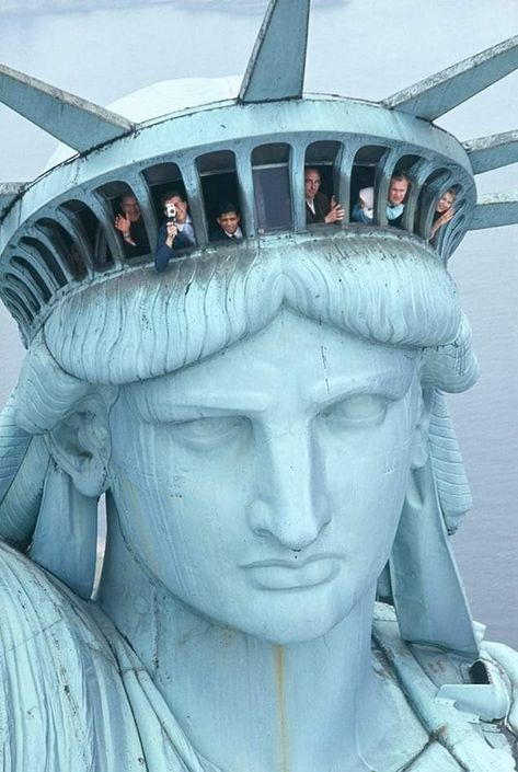 Tourists look out the windows on the Statue of Liberty's crown. No date given, but it looks like it could be early 1960s? Statue Of Liberty Crown, Liberty Island, Nyc Summer, New York Harbor, New York Street Style, The Statue Of Liberty, Historic Photos, Lady Liberty, City That Never Sleeps