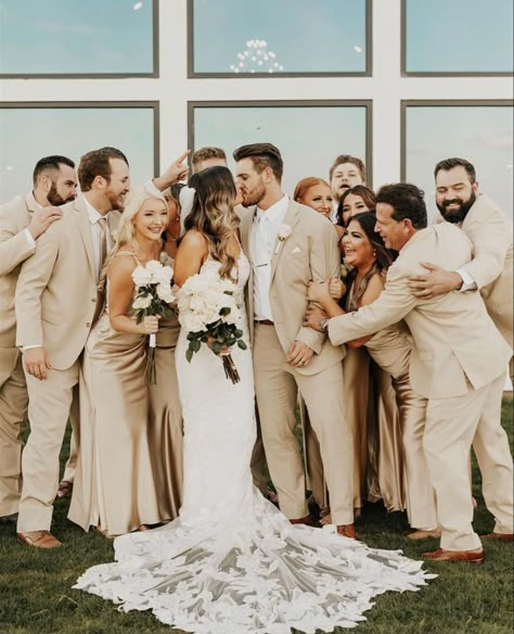 Gold Bridesmaid Dresses And Groomsmen, Groom In Cream Suit, Beige Wedding Party Groomsmen, Neutral Bridal Party Groomsmen, Cream Tux Wedding, Champagne Bridesmaid Dresses And Grooms, Taupe Groomsmen Suits, Sand Colored Groomsmen, Neutral Wedding Groom