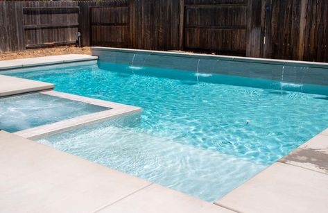 Small Pool With Tanning Ledge And Hot Tub, Swimming Pool With Tanning Ledge, Pool With Sun Shelf And Spa, In Ground Pool With Tanning Ledge, Liner Pool With Hot Tub, Geometric Pool Designs With Spa And Tanning Ledge, Pool Landing Ideas, Simple Pool Water Feature, Gunite Pool Ideas With Tanning Ledge