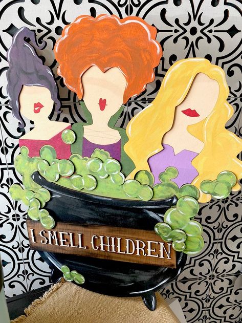 Dive into Hocus Pocus-themed decorations perfect for school or home, including door hangers and DIY projects that celebrate the magic of the Sanderson sisters! Hocus Pocus Window Display, Hocus Pocus Door Decorations, Hocus Pocus Door Decorations For School, Hocus Pocus Classroom Door, Hocus Pocus Door Decor, Hocus Pocus Decor Diy, Hocus Pocus Bulletin Board, Hocus Pocus Decorations Diy, Halloween Booth Ideas