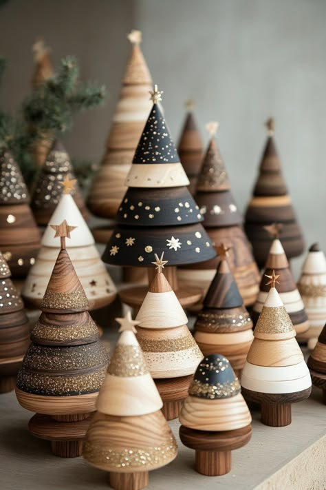 Artistic display of wooden Christmas tree toys in various shades and glitter, highlighting natural beauty and craftsmanship. Decorative Wooden Christmas Trees, Cone Christmas Trees Decorating Ideas, Painting Wooden Christmas Trees, Pesebres Navidad Ideas Madera, Wood Trees Diy, Painted Wooden Christmas Trees, Wooden Xmas Decorations, Terra Cotta Christmas, German Christmas Decor