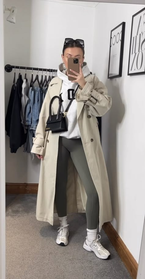 Womens Long Trench Coat, Trench Coat Outfit New Balance, Trench With Leggings, Sweatshirt Trench Coat Outfit, Stone Trench Coat Outfit, Sporty Trench Coat Outfit, New York Trench Coat Street Styles, Winter Outfits With Trench Coats, Comfy Trench Coat Outfit