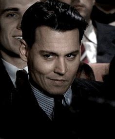 Johnny Depp as John Dillinger in the 2009 film, "Public Enemies." John Dillinger Johnny Depp, Johnny Depp Public Enemies, Johnny Depp Hairstyle, John Dillinger, Public Enemies, Half Smile, Johnny Depp Movies, Johnny D, Here's Johnny