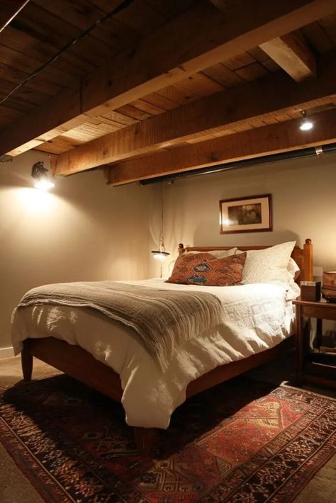 Converting an unfinished basement into a bedroom can provide extra space and add value to your home. It might seem daunting, but with some planning and creativity, you can transform the often-overlooked area into a cozy and inviting retreat. Here are 25 Transformative Unfinished Basement Bedroom Ideas. Rustic Basement Bedroom Ideas, Unfinished Basement Bedroom Ideas On A Budget, How To Make An Unfinished Basement Cozy, Temporary Basement Bedroom, How To Make A Basement Bedroom Cozy, Basement Room Ideas Bedrooms Unfinished, Bedroom No Windows Ideas, Basement Bedroom No Windows, Basement Bedroom Layout Ideas