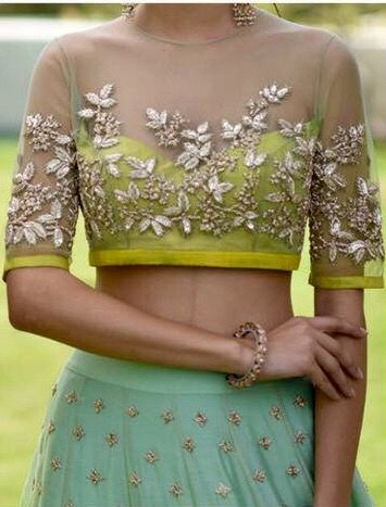 20+ Latest Golden Blouse Designs | Wedlockindia.com Latest Lehenga Blouse Designs, Golden Blouse Designs, Netted Blouse Designs, Blouse Designs Catalogue, Lehenga Blouse Designs, Blouse Back Neck Designs, Indian Saree Blouses Designs, Blouse Designs Indian, Red Lehenga