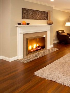 Walnut floor with great contrast of whites & tans for the rug, fireplace tiles, wall... Living Room Colour Schemes, Cherry Wood Floors, Cherry Floors, Living Room Wood Floor, Brazilian Cherry, Brown Floors, Floor Ideas, Room Color Schemes, Bamboo Flooring