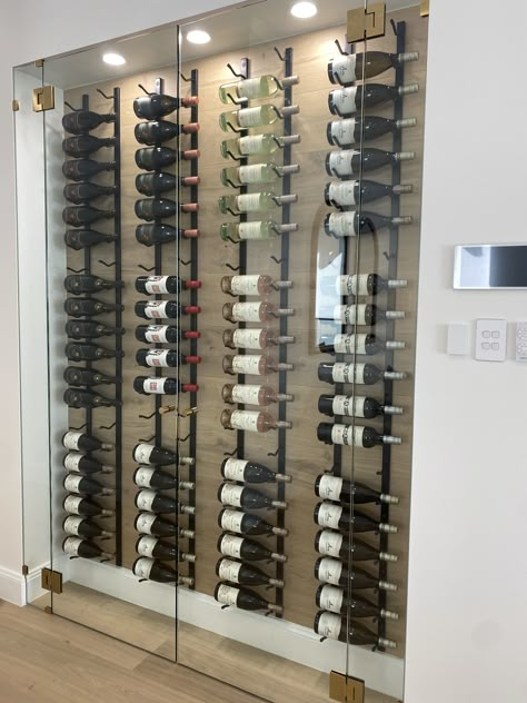 Glass Wine Cooler Wall, Indoor Wine Cellar, Modern Wine Wall Display, Refrigerated Wine Wall, Glass Enclosed Wine Wall, Wine Cellar Wall Dining Room, Glass Wine Wall, Wine Cellar Lighting, Wine Wall Display