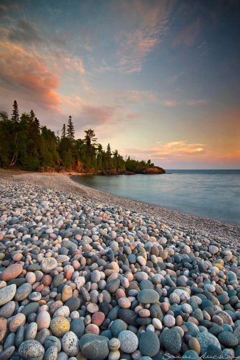 A pebble beach on Lake Superior near Wawa, Ontario Canada. [1331x2000] [OC] IG:@sarahfurch : EarthPorn Rocky Shoreline, Northern Ontario, Sun Setting, Lake Beach, Oh Canada, Geocaching, Pebble Beach, Lake Superior, North Shore