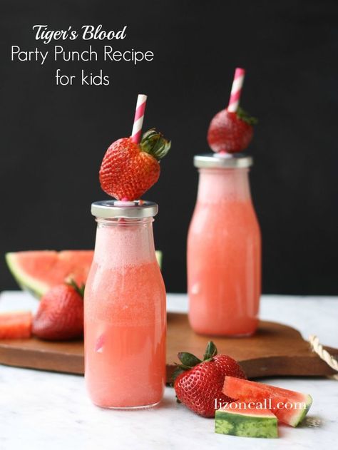 With a name like tiger's blood, this party punch for kids is sure to be a hit at your next kid's celebration. Party Punch Kids, Summer Party Punch, Call Recipes, Punch For Kids, Punch Recipes For Kids, Popular Drink Recipes, Party Punch Recipe, Easy Party Punch, Alcoholic Punch Recipes