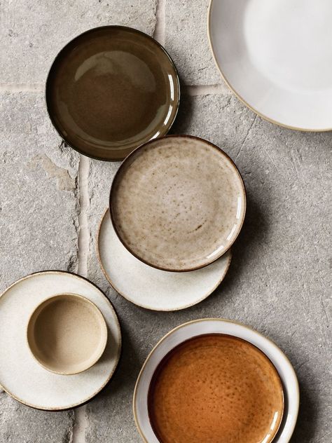 The newest evolution of our coveted Marin dinnerware crafts the collection's signature organic curves with Ecogresr-stoneware made of 90% recycled clay. The dinner plate showcases a subtly shiny white glaze that's unique to each piece and allows for peeks of the natural earthy clay to show through. Hand-finished by highly skilled artisans in Portugal to make each one unique, the freeform-rim plate stands up to everyday use and dishwasher cleaning. It's artisanal dinnerware designed to be lived w Dinnerware Sets Classic, Rustic Plates Tableware, Black Stoneware Table Setting, Dinner Party Serveware, Ceramic Dinnerware Set Rustic, Moody Place Setting, Scandinavian Dishes Set, Table Wear Set, Restaurant Plates Design