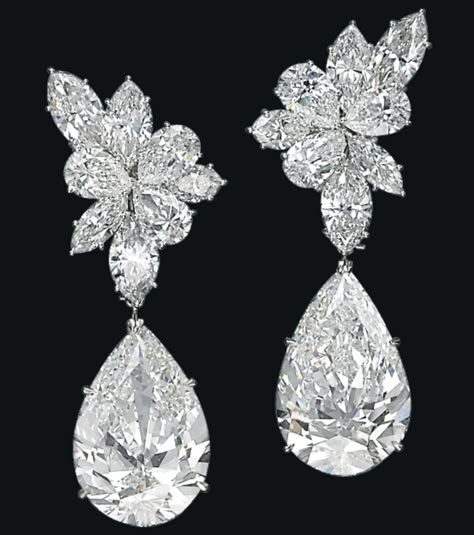 Harry Winston - A Pair of Diamond Ear Pendants - Each top designed as a cluster of marquise and pear-shaped diamonds, suspending a detachable pear-shaped diamond, weighing approximately 19.57 and 19.09 carats, mounted in platinum, 5.5 cm. With maker's mark for Jacques Timey and signed Winston for Harry Winston. Harry Winston Jewelry, Harry Winston, Diamond Earring, Fabulous Jewelry, Gold Price, Ear Rings, Gorgeous Jewelry, Diamond Cluster, Diamond Jewellery