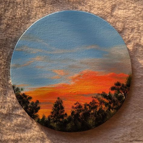 What is it about sunsets that you like? Acrylic on canvas✨ Available for SALE #art #acryliconcanvas #acrylicpainting #sunset #sky #clouds #sunsetpainting #artsandhya #aesthetic #explore Fall Sky Painting, Circular Art Ideas, Circle Canvas Painting Aesthetic, Circle Canvas Ideas, Painting On Circle Canvas, Circle Canvas Painting Ideas, Circular Painting Ideas, Sunset Clouds Painting, Round Canvas Painting Ideas Easy