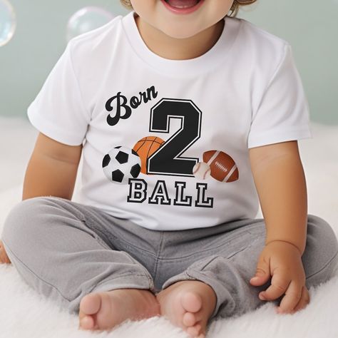 Celebrate your little MVP's 2nd birthday with the Born 2 Ball Sport Themed Toddler T-shirt! This adorable shirt is perfect for your sports-loving toddler's special day. Made with high-quality materials, this shirt is comfortable and stylish for any birthday celebration. Get ready to score some major style points with this cute and sporty design! #2ndBirthday #ToddlerFashion #SportsTheme #Born2Ball #BirthdayParty #ToddlerStyle #SportsFan #BirthdayOutfit #KidsApparel #SportyKids Born 2 Ball, Boy 2nd Birthday, Toddler Boy Clothing, 2nd Birthday Boys, Toddler Girl Clothing, Sports Theme Birthday, Ball Birthday Parties, Sports Birthday Party, Birthday Boy Shirt