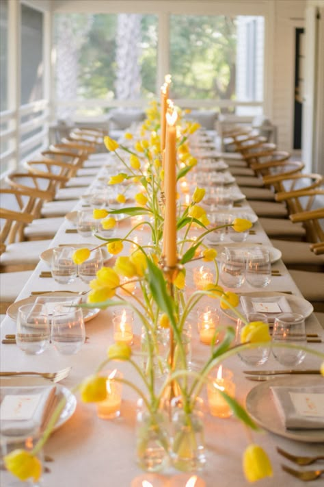 This beautiful porch dinner party is the epitome of spring! Bright tulips and votive candles paired with neutral china placed on top of a simple linen created the perfect spring dinner party decor. Tulip Theme Party, Porch Dinner Party, Tulip Wedding Theme, Spring Event Ideas, Spring Engagement Party, Dinner Party Centerpieces, Tulip Centerpiece, Easter Porch Decor, Fresh Tulips