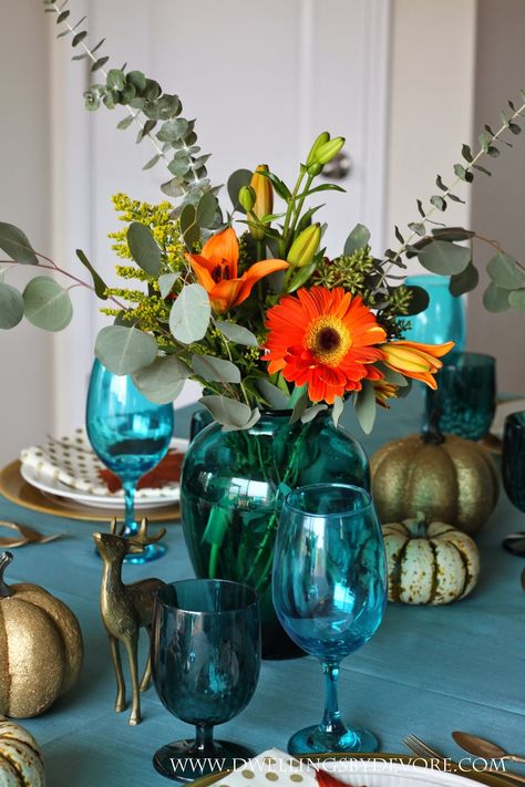 non traditional fall table setting, teal, orange and brown Blue And Orange Fall Decor, Orange Fall Decor, Teal Table, Table Settings Everyday, Turquoise Table, Thanksgiving Table Setting, Thanksgiving Table Decor, Teal And Orange, Holiday Table Settings