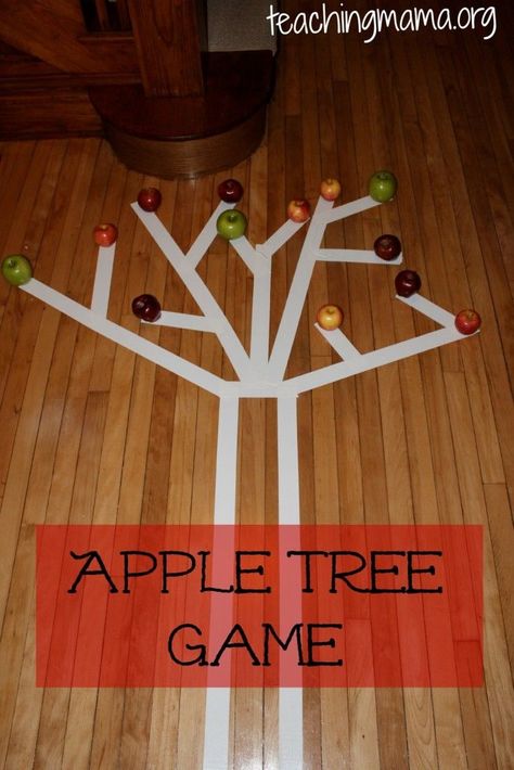 This sounds like an amazing indoor gross motor activity!  The children balance-walk on the tape, "pick" one apple and "climb" back down the tree to place in a basket below the trunk.  Love it! Indoor Games Room, Preschool Apples, Preschool Apple Theme, Teaching Mama, Gross Motor Activity, Apple Preschool, Apple Unit, Apple Activities, Apples To Apples Game