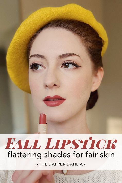 Woman with red hair and fair skin wearing a yellow beret and holding a tube of lipstick by Ilia. Fall Lipsticks For Fair Skin, Fall Makeup For Fair Skin, Brown Lipstick For Fair Skin, Warm Autumn Lipstick Colors, Fall Lipstick Colors 2024, Soft Autumn Red Lipstick, Redhead Lipstick Shades, True Autumn Lipstick, Deep Autumn Lipstick