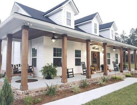 L Shape Porch Ideas, White Farmhouse With Shutters, White House Black Windows Wood Accents, Remodel Front Of House, Small Farmhouse Exterior Ideas, White Rustic House Exterior, White House With Black And Wood Accents, Rustic Home Exterior Colors, Country Home Outside