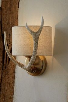 Natural Antler Wall Light £45 Wall Light Designs, Celtic Wood, Wall Lights Indoor, Antler Projects, Deer Antler Crafts, Antler Lamp, Antler Ideas, Indoor Wall Light, Antlers Decor