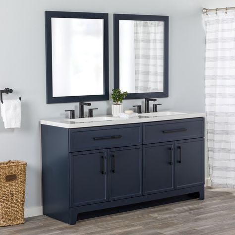 Transform your bathroom with the Potter 60.5-in W deep blue vanity. This double-sink bathroom vanity features a Shaker-style design that’s complemented by a 1-piece white cultured marble sink top and matte black hardware. Pre-assembled and ready to install, this vanity also includes a wraparound drawer with 3 compartments and a 2-door cabinet below each sink for easy-access storage space. This transitional vanity adds style and storage in large a Navy Vanity White Tile Bathroom, Blue Double Sink Bathroom Vanity, Bathroom Cabinet Navy, Navy Vanity With Black Hardware, Blue Vanity Bathroom Black Hardware, Navy Bathroom Vanity Wallpaper, Guest Bathroom Blue Vanity, Double Vanity Small Bathroom Ideas, Navy Blue Cabinets With Black Hardware