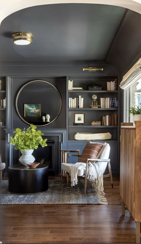 Living Room Designs Farmhouse, Office With Fireplace, Scandi Furniture, Moody Living Room, Navy Living Rooms, Circular Coffee Table, Dark Blue Walls, Transitional Decor Living Room, Classic Armchair