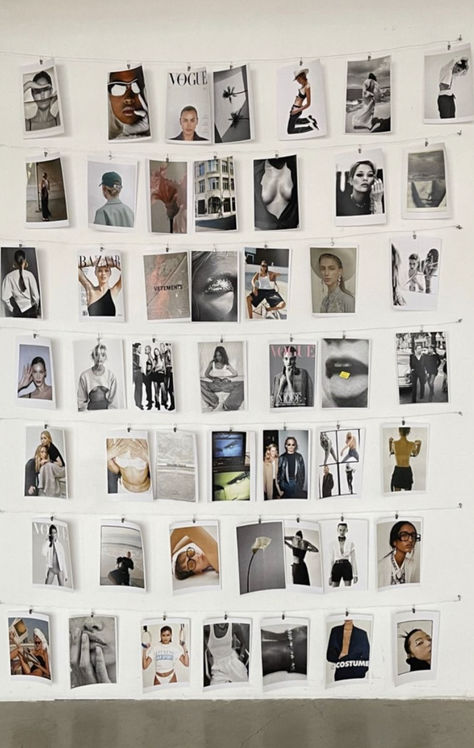 A wall filled with artistic and fashion photography prints, providing abundant inspiration for those looking to enhance their creative vision in 2024. Creative Studio Aesthetic, Fashion Public Relations Aesthetic, Creative Job Aesthetic, Graphic Design Student Aesthetic, Fashion Marketing Aesthetic, Art Director Aesthetic, Fashion Brand Aesthetic, Creative Director Aesthetic, Brand Vision Board