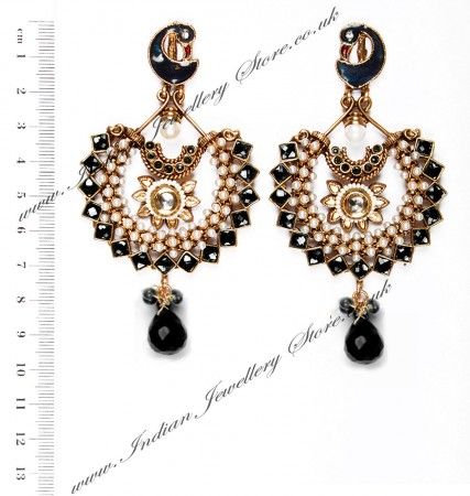 Indian chandelier chand bali earrings in 22k gold plated with black. Set with faux pearl and polki stones. These chandelier chand bali earring have an indicate design including meena (enamel) work. Indian Jewellery Store LOVES this product. Other colours available. Scale shown in image is in cm. Indian Chandelier, Chand Bali Earrings, Chand Bali, Bali Earrings, Peacock Earrings, Chandbali Earrings, Jewellery Store, Gold Colour, Black Set