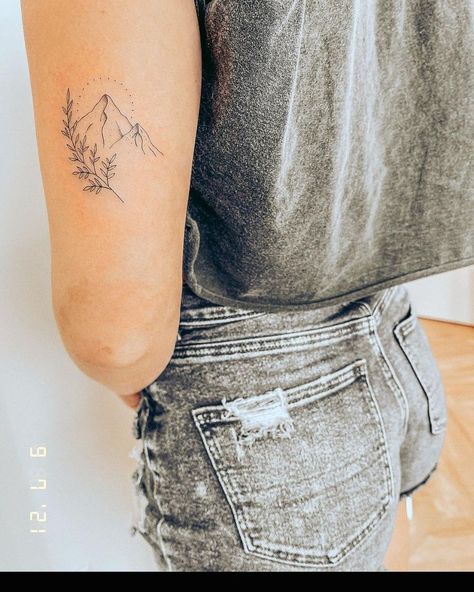 Elegant Western Tattoos, Mountain With Wildflowers Tattoo, Small Mountain Tattoos For Women Forearm, Mountain Name Tattoo, Inner Arm Mountain Tattoo, Mountain With Stars Tattoo, Mountain Floral Tattoo, Nature Tattoo Women, Floral Mountain Tattoo