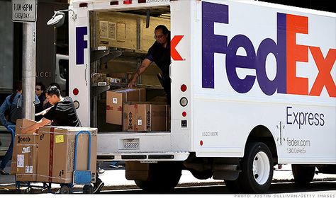 FedEx: Cyber Monday is the busiest day ever Walmart Clients, Fedex Package, Id Card Photo Makeup, Drip In Hospital, Hands With Drip In Hospital, Id Card Photo, Cracked Iphone, Pastor Rick Warren, Green Transportation