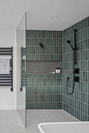 If you're thinking about incorporating a wet room into your home, you'll want to take a look at these 15 spaces which are full of design inspiration. #wetroomideas #bathrooms #apartmentliving #smallspacedecorating #thespruce Modern Luxury Ensuite Bathroom, Spa Wet Room, Green Wet Room, Wet Room Bathroom Floor Plans, Master Bath Wet Room Layout, Small Shower Room Ideas Narrow, Small Wet Bathroom Ideas, Wetroom Ideas Small Wet Rooms, Wet Room Bathroom Small Layout