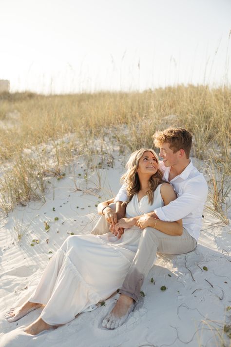 Pensacola Beach Engagement Session | marleegentryphotography.com Couple Beach Photo Outfits, Beach Pics For Couples, Engagement Pics On Beach, Save The Date Beach Photoshoot, Couples Pics Beach, Engagement Pictures Poses Beach, Beach Engagement Photo Outfits, Engagement Pictures On Beach, Playful Beach Engagement Photos