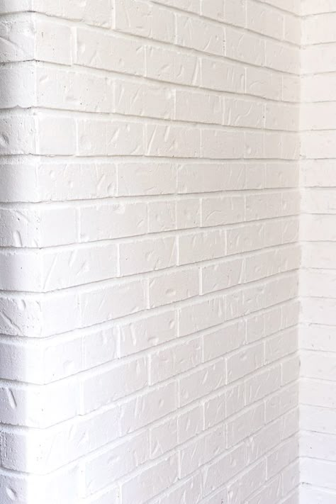 3 Easy Steps to Update Pre-painted Brick | Noting Grace Painted Brick Columns, Paint Brick White, Paint Brick Wall, How To Paint A Brick Wall, Painted Brick Bathroom Wall, How To Paint Brick Wall, White Painted Brick Interior Wall, Painting Brick Pavers, White Brick Basement Walls