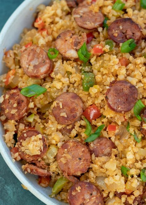 Cajun Sausage Cauliflower Rice Cajun Cauliflower Rice, Riced Cauliflower Recipes, Sausage Cauliflower, Cajun Cauliflower, Keto Cauliflower Recipes, Rice With Sausage, Keto Pork Recipes, Sausage And Vegetables, Cajun Dirty Rice