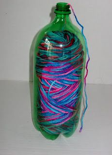 Luksi Creations: How to make a holder for your yarn out of a pop bottle Diy Yarn Holder, Yarn Holders, Crochet Yarn Holder, Crochet Organizer, Yarn Organization, Crochet Hack, Yarn Holder, Yarn Storage, Diy Yarn