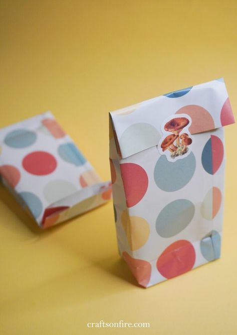 How To Make A Gift Bag From Patterned Paper - Craftsonfire Diy Paper Bags Gift, Present Bag Diy, Gift Bag Diy Paper, How To Make A Small Paper Bag, How To Make Small Gift Bags Out Of Wrapping Paper, Making Gift Bags From Paper, How To Make Gift Bags Out Of Paper, Diy Paper Gift Boxes Simple, How To Make Small Paper Bags