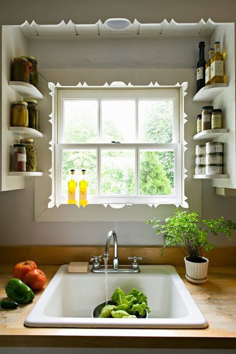 Sylish and functional kitchen shelving ideas for a perfectly organized cooking space - http://www.elledecor.com/design-decorate/g12019319/kitchen-shelves/?src=socialflowFB Space Above Kitchen Sink, Shelves Above Sink, Kitchen Window Shelves, Sink Window, Above Kitchen Sink, Kitchen Sink Window, Window Kitchen, Above Sink, Mother Earth Living