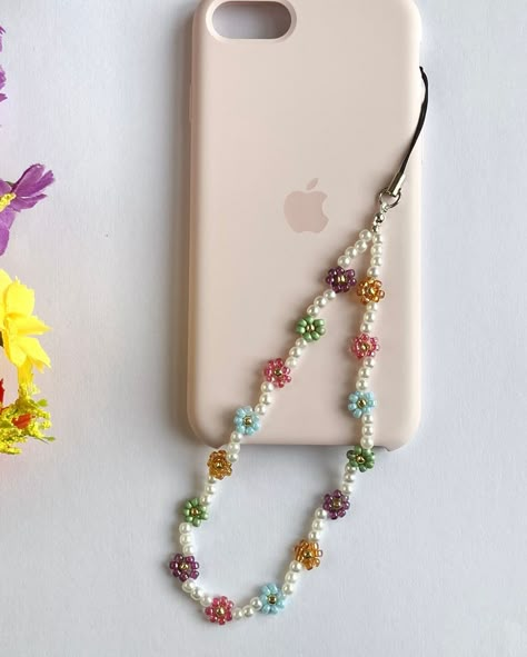 Beaded flower phone straps 🌸🌼🌺 Which colourway is your fave? #phonestraps #phonebeads #beadedflower #phoneaccessories #cottagecoreaesthetic Beaded Flower Keychain, Phone Jewelry Accessories, Phone Beads Strap, Diy Phone Strap, Phone Charms Diy, Diy Phone Charms, Phone Strap Beads, Keychain With Beads, Phone Hanger