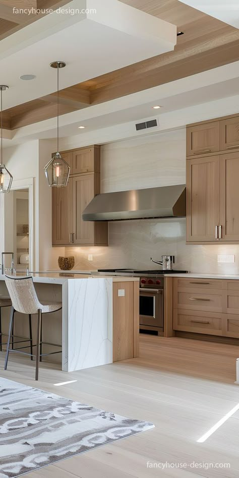 The kitchen features maple wood cabinets that bring a natural, cozy feel to the space with their soft grain. Modern Maple Kitchen, Maple Wood Cabinets, Natural Wood Kitchen Cabinets, White Oak Kitchen, Kitchen Design Gallery, Natural Wood Kitchen, Maple Kitchen Cabinets, Colonial Kitchen, Maple Kitchen